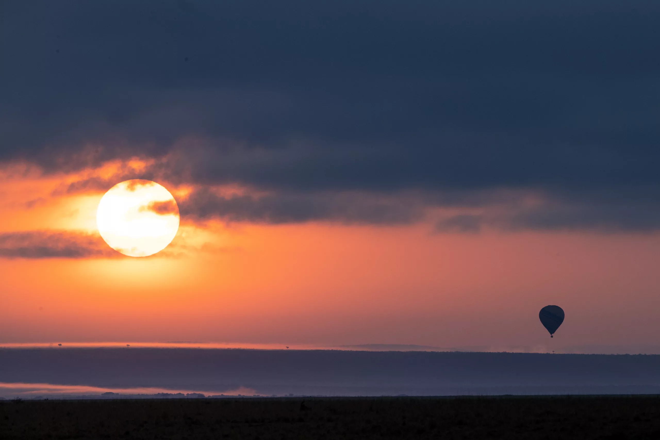 Hot air baloon on the masai mara by Charl Stols