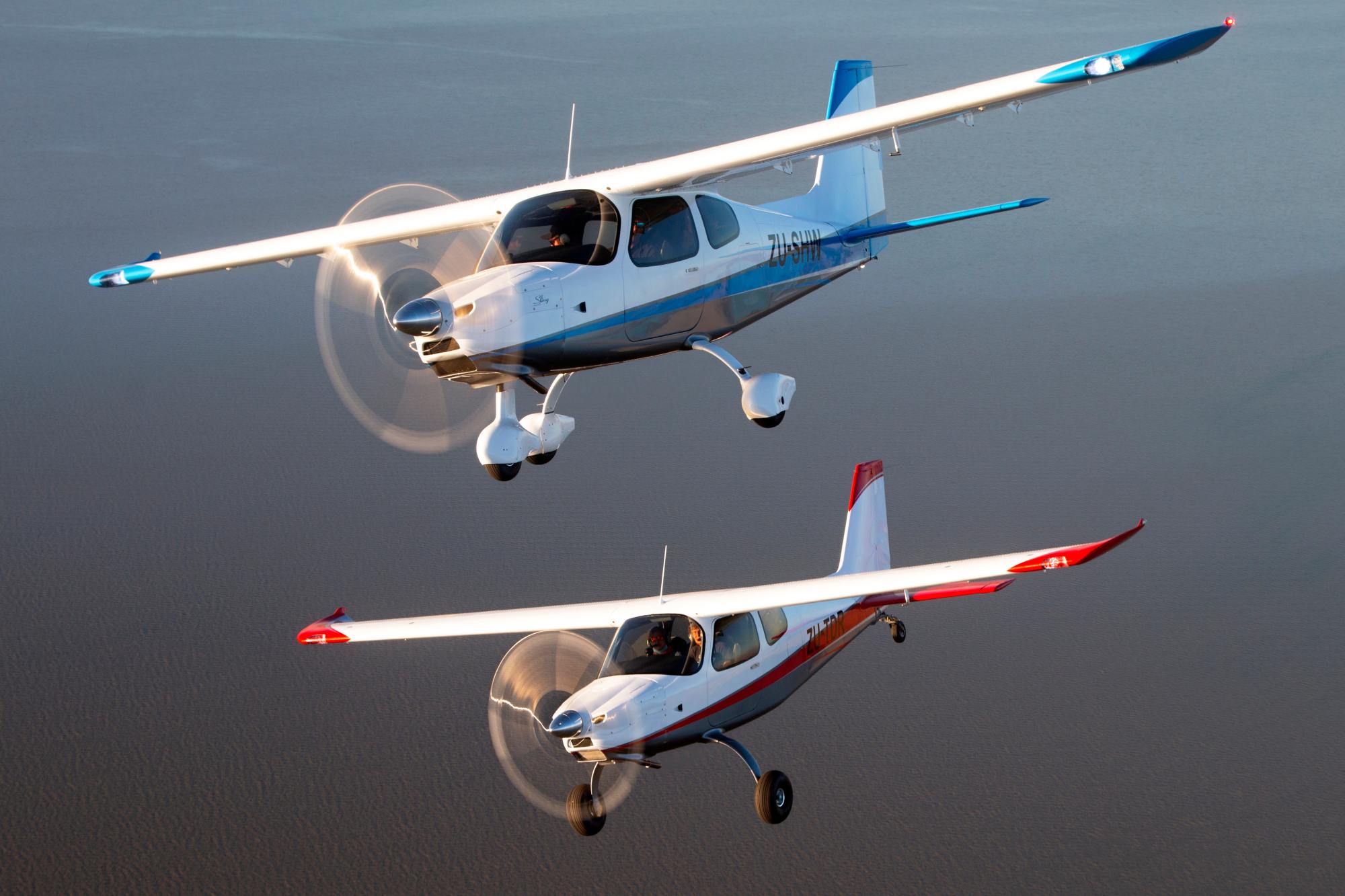 Two sling aircraft in flight The Sling High Wing Variants