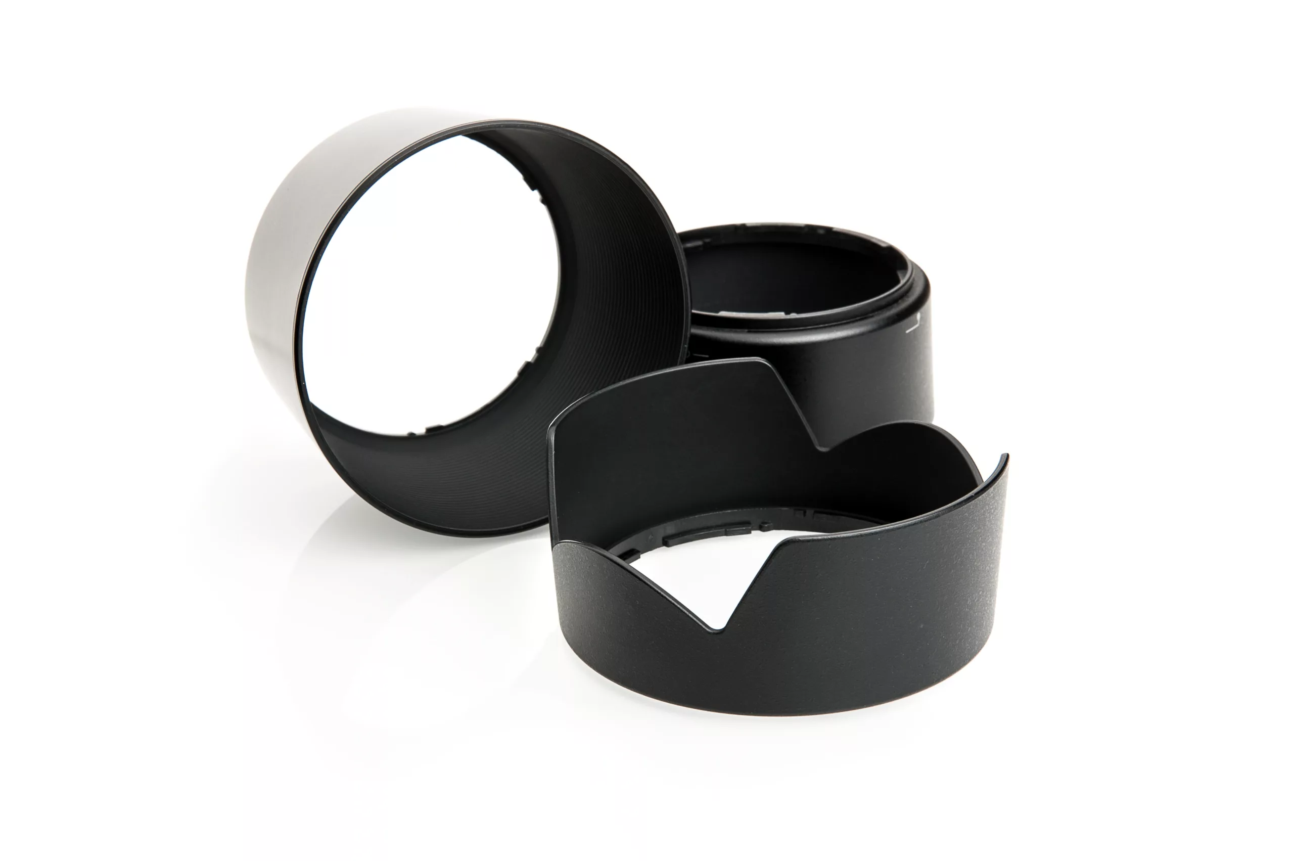 Different styles of camera lens hoods Different style lens hoods
