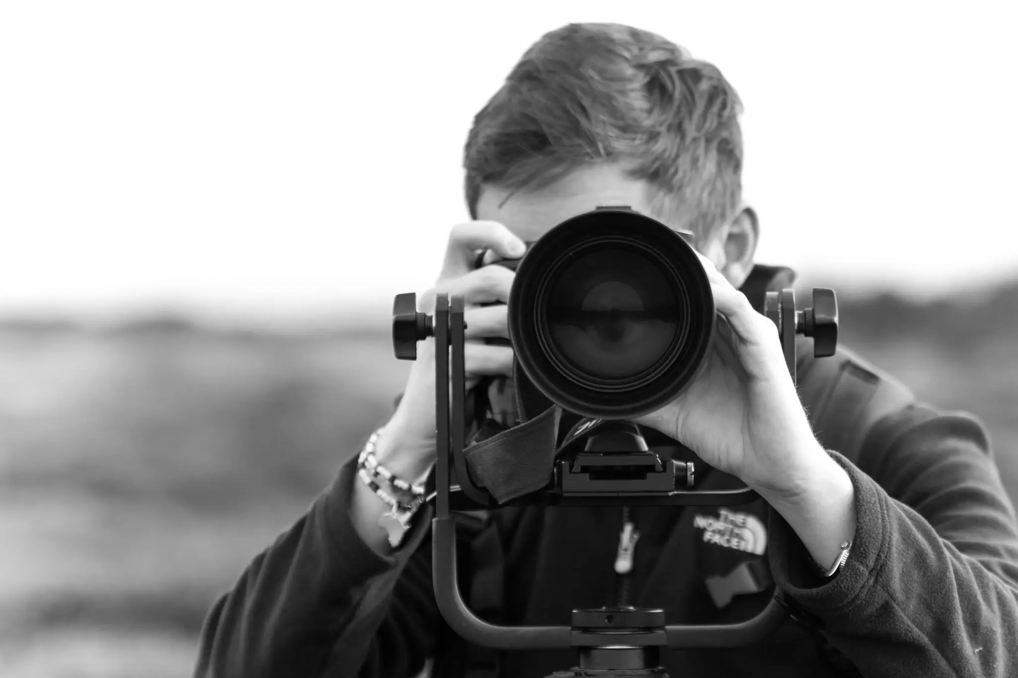 William steel with a camera and lens hood