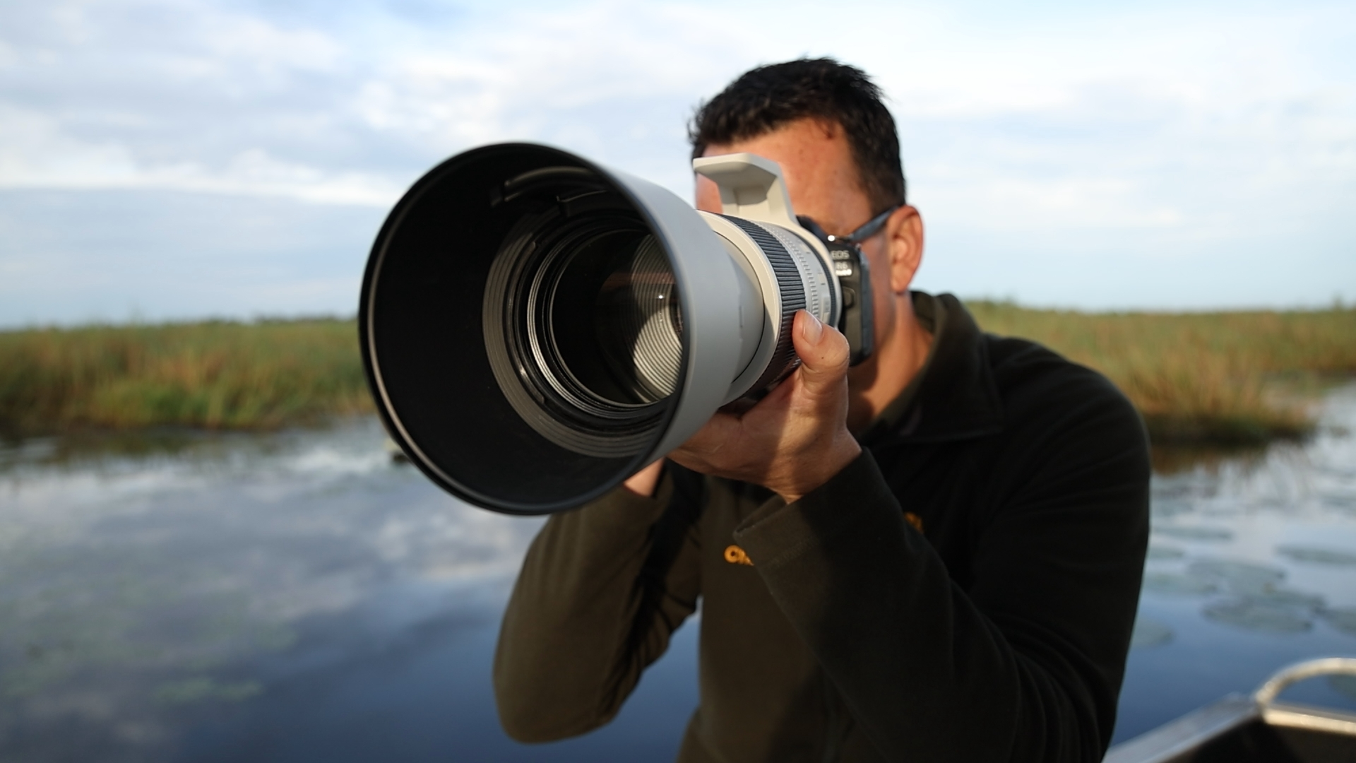 charl stols on the chobe river canon eos r6 mark ii for wildlife photography Charl Stols| Pangolin Photo Host | Leopard Photography Tips
