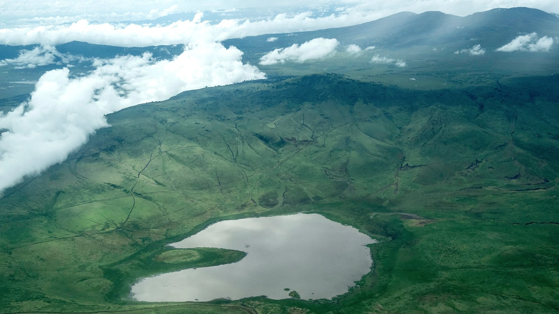 aerial view of ngorongoro crater in the ngorongoro conservation area, tanzania Aerial view of Ngorongoro crater in the Ngorongoro conservation area Tanzania