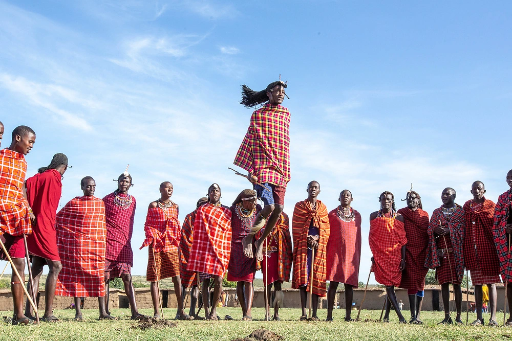 janine krayer vibrant clothing of maasai warriors definitely one of the masai mara highlights Vibrant Clothing of Maasai Warriors - Definitely one of the Masai Mara Highlights